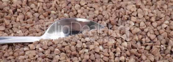 buckwheat background and teaspoon