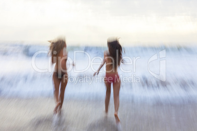 Motion Blur Girls Women Running on Beach