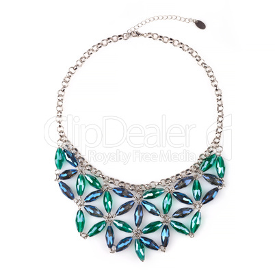Silver necklace with blue and green rhinestones, isolated on whi
