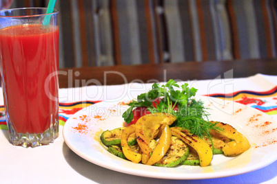 dish for vegetarians vegetables grilled and tomato juice