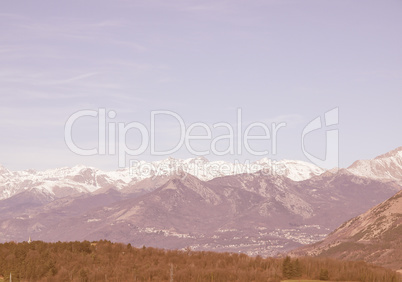 Retro looking Alps mountains