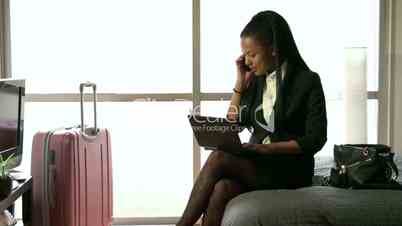 Multi-ethnic Businesswoman Woman Working With Computer Hotel Room Business Travel