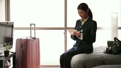 Work Asian Manager Woman Businessswoman Ipad Tablet In Hotel Room