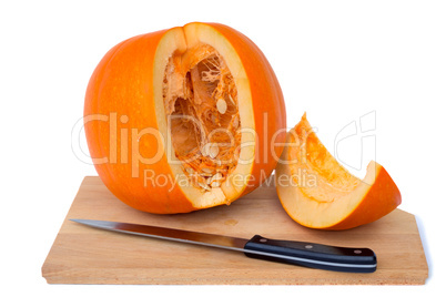 Ripe cut the pumpkin on a white background.