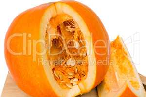 Ripe cut the pumpkin on a white background.