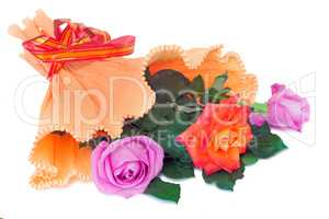 Bouquet of roses in a beautiful package on a white background.