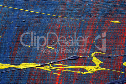 Brushstroke - yellow,blue  and red paint  on metal surface