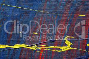 Brushstroke - yellow,blue  and red paint  on metal surface