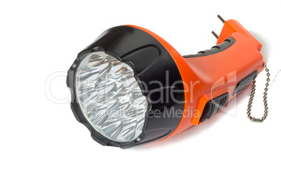 Electric rechargeable led flashlight on a white background.