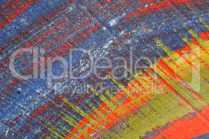 Brushstroke - yellow,blue,black and red paint  on metal surface