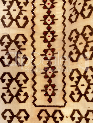 Close up of a hanged colourful handmade traditional wool rug