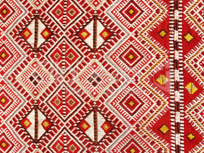 Close up of a hanged colourful handmade traditional wool rug