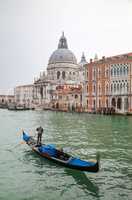 Gondola at Grand Canal in front of basilica Di Santa Maria della