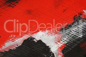 Brushstroke - white,black and red acrylic paint  on  metal surfa