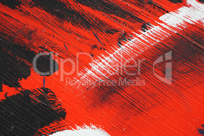 Brushstroke - white,black and red acrylic paint  on  metal surfa