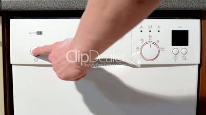 turn on the white dishwasher