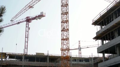Building construction with crane.