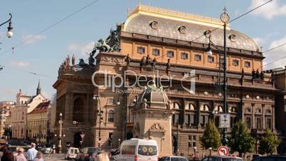 National theatre and street with people - sunny day