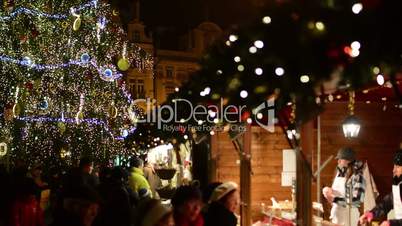 Old Town Square - Christmas markets with people and christmas tree - in night