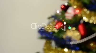Part of decorated Christmas Tree - white background - blurred shot