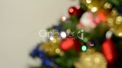 Part of decorated Christmas Tree - white background - blurred shot