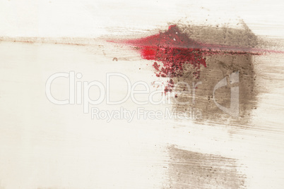 Brushstroke with red and brown paint  on dusty metal fence