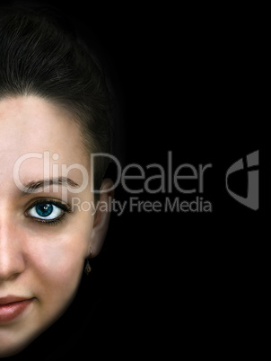 Portrait of young sensual brunette girl on black background