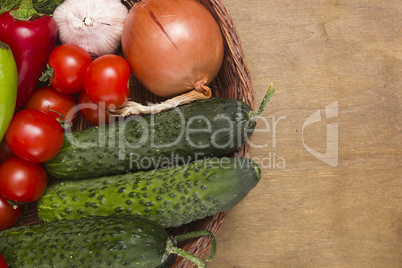 Fresh cucumbers in a wicker basket