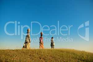 Group Asian Burmese traditional farmers walking home