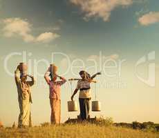 Group Asian Burmese traditional farmers in sunset