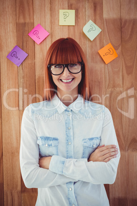 Portrait of a hipster woman front of post-it