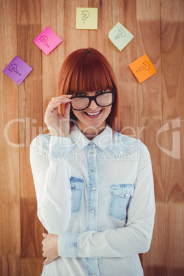Portrait of a hipster woman front of post-it