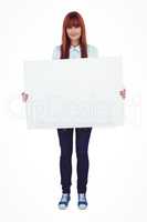 Attractive hipster woman holding white card
