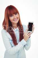 Smiling hipster woman showing her smartphone