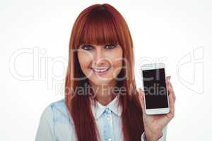 Smiling hipster woman showing her smartphone