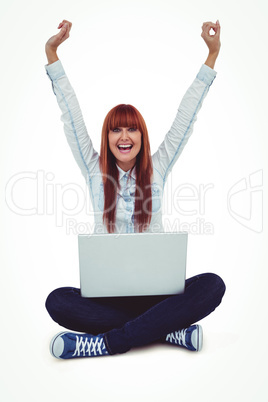 Hipster woman with laptop and hands up