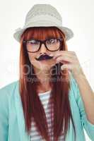 Happy smiling hipster with a mustache