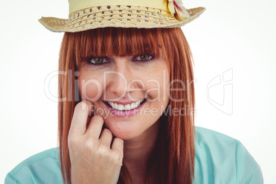 Portrait of a smiling hipster woman wearing hat