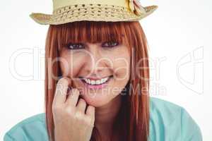 Portrait of a smiling hipster woman wearing hat