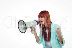 Hipster woman shooting through megaphone