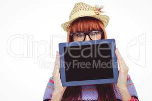 Attractive hipster woman behind a tablet