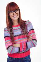 Portrait of a smiling hipster woman with arms crossed