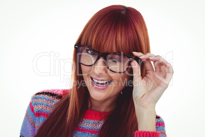 Smiling hipster woman doing a wink