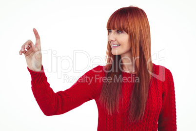 Smiling hipster woman pointing something