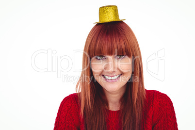 Smiling hipster woman with party hat