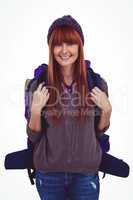 Smiling hipster woman with a travel bag