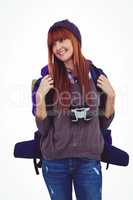 Smiling hipster woman with a travel bag