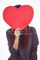 Hipster woman behind a red heart