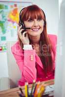 Smiling hipster businesswoman using headset