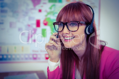 Smiling hipster businesswoman with headset